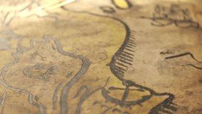 Funny hand-drawn ancient map with animated drawings. Camera is  moving over the map showing sailing pirate ship, flag, palm trees, cannibal dancing near the pot and treasure chest full of gold
 - Powered by Shutterstock - Get 15% off with code: PIKWIZARD15
