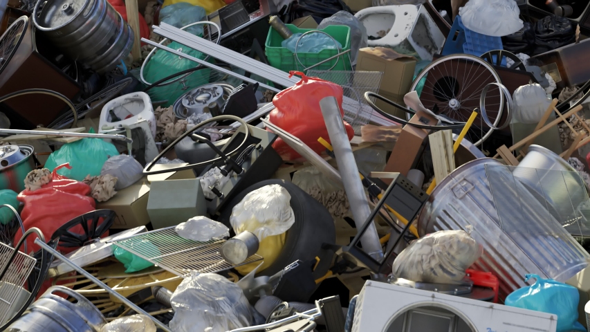 Loopable animation with the rubbish dump. Landfill of the waste. Dirty plastic, metal and paper garbage. Junkyard full of messy trash polluting the environment. Ecological disaster
