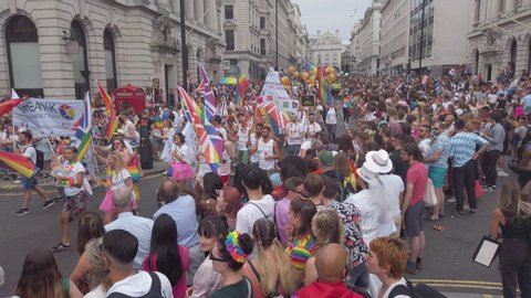 LONDON, UK - July 6th 2019: Large crowds of people attend the annual LGBTQ gay pride march n London