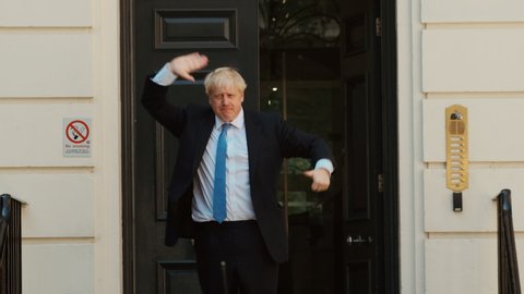 LONDON, circa 2019 - British Prime Minister Boris Johnson salutes the crowds in London, England, UK after becoming British Prime Minister