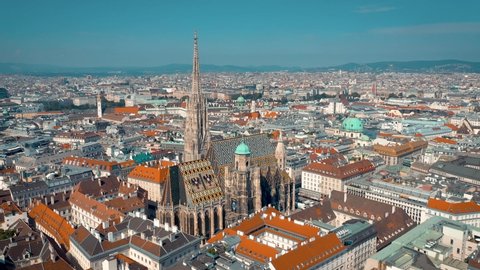 VIENNA, AUSTRIA - JUNE, 2019: City skyline aerial drone shot. Cathedrals and cityscape. Significant tourist sites from above. Historical centre with beautiful architecture.