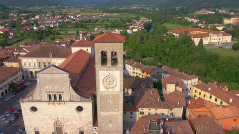 UDINE PROVINCE, ITALY - JUNE, 2019: Aerial panorama drone view of small town Cividale del Friuli historical centre with beautiful architecture. Significant tourist sites from above.