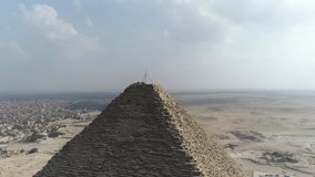 This is a short video of a drone shot of the Pyramids of Giza in Egypt.