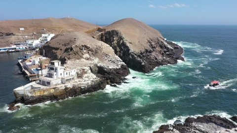 Lima, Peru - 07 14 2019: Aerial view from island at Pucusana´s fishing cove located in Perú