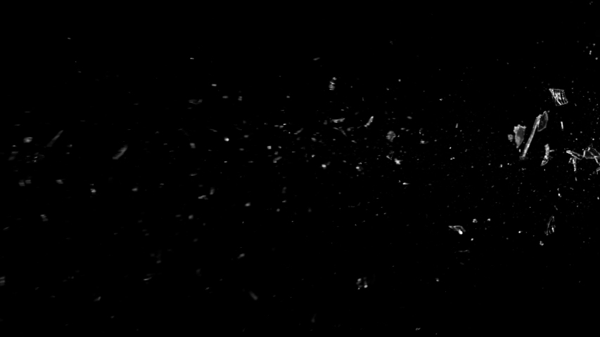 Super slow motion of shattered glass on black background. Filmed on high speed cinema camera, 1000 fps. Royalty-Free Stock Footage #1033841141