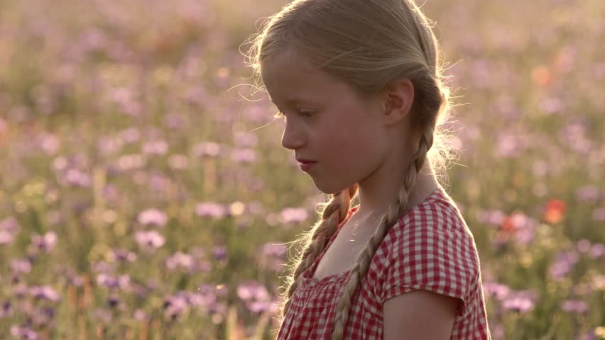 Happy Little Girl Playing Outdoor, Smelling Poppy Flower Flower Field, Summer, Spring Landscape, Slow motion.