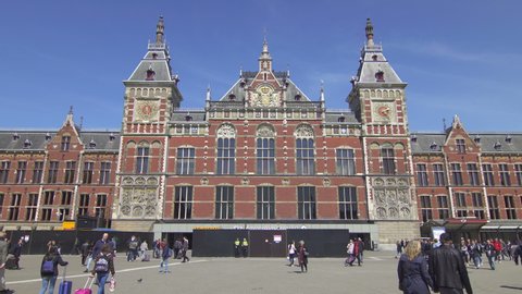 AMSTERDAM, NETHERLANDS - CIRCA 2019: Main entrance to Amsterdam central station building