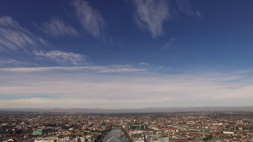 Drone aerial view of Dublin city, Ireland, looking west up the river Liffey.