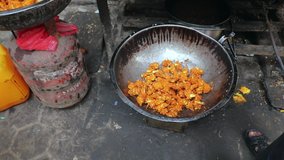 B-roll footage of fresh Kathmandu street food in a metal bowl