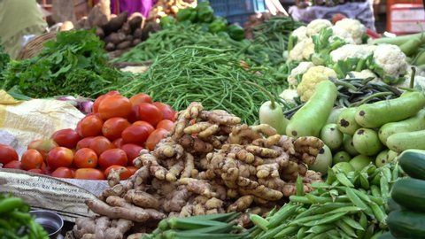 slider shot vegetable counter farmers market Stock Footage Video (100% ...