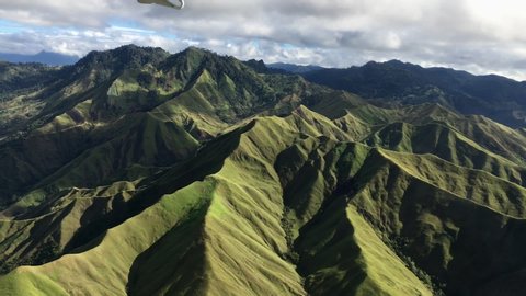 Kodiak aircraft flying over the beautiful mountains of Papua New Guinea