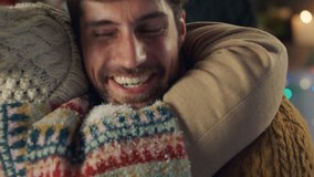 african american grandparents hug visiting for christmas young man hugging grandmother enjoying festive holiday celebration on winter evening at home 4k footage - Powered by Shutterstock - Get 15% off with code: PIKWIZARD15