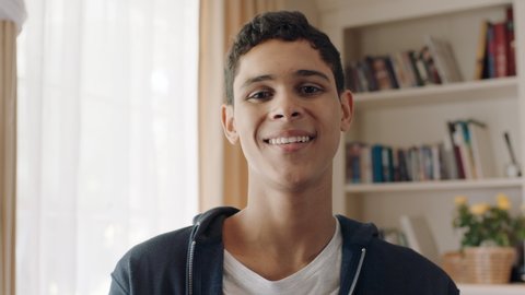 portrait handsome teenage boy smiling feeling happy enjoying confident self image normal teen at home 4k