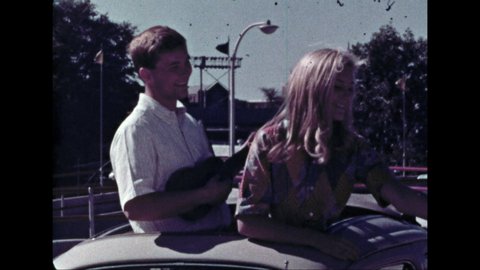 1960s: UNITED STATES: young people drink cola in car. Girl on telephone drinks bottle of coke. People in pool on sunny day