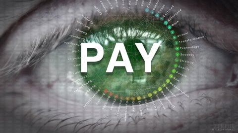 Close up of an eye focusing on a Pay concept on a futuristic screen.
