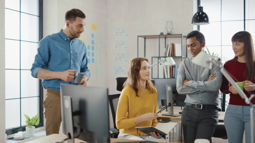 In the Modern Office: Diverse Group of Colleagues Have Meeting, Develop Strategy, Discuss Project Progress, Customer Experience Management also Have a bit Of Fun and Jokes. Smiling Businesspeople Chat Royalty-Free Stock Footage #1033983023
