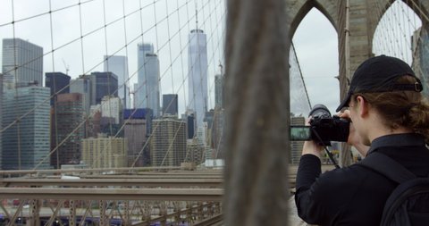 Photographer Taking Pictures Beautiful Brooklyn Bridge And Iconic New York Skyline With Incredible NYC Skyscrapers