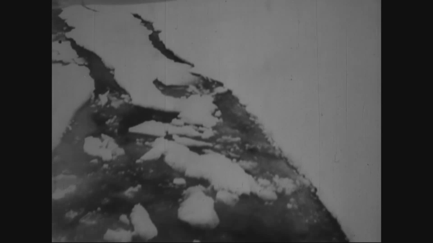CIRCA 1920s - Footage shot from the bow of a cutter shows the view as it sails through an ice field. Royalty-Free Stock Footage #1033997231