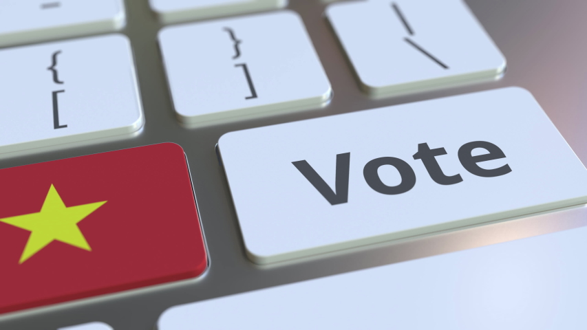 VOTE text and flag of Vietnam on the buttons on the computer keyboard. Election related conceptual 3D animation