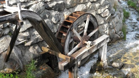 wheel of water saw mill in the town of Grimentz. CH Switzerland. 22nd July 2019