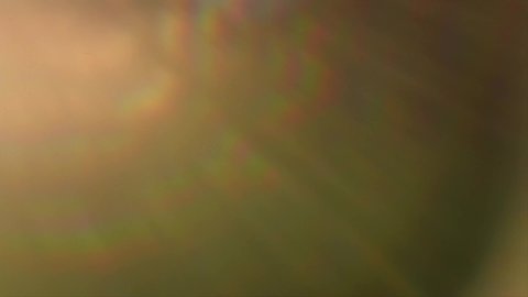 Lens flare effect on black background. Abstract Sun burst, sunflare For screen mode using. Sunflares nature abstract backdrop, blinking sun burst, lens flare optical rays. 4K UHD video