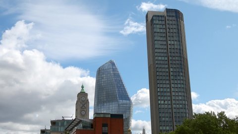 London, United Kingdom (UK) - 08 24 2018: One Blackfriars, The Southbank Tower and The OXO Building, London, England with white clouds and a blue sky in the background.