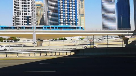 View of Dubai city modern metro on the famous Sheikh Zayed road - Dubai towers and skyscrapers
- Dubai, UAE, July 23, 2019
