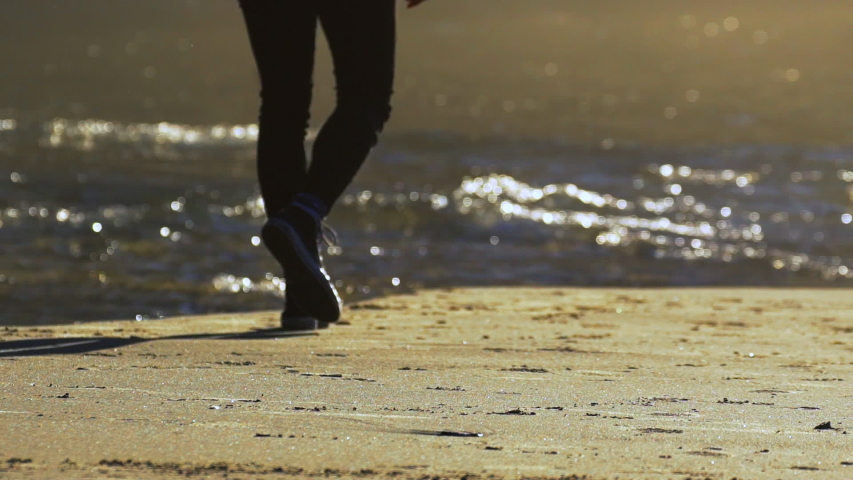 converse on the beach