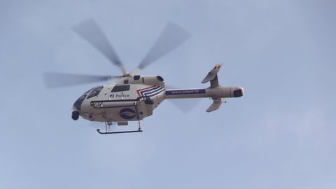 Brussels, Belgium - 03 31 2019: a police helicopter keeping surveillance during a demonstration
