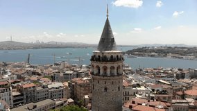 Aerial view of Galata tower, one of the ancient symbols in Istanbul. Bosphorus and Istanbul skyline. Istanbul, Turkey. Shot from a drone.
