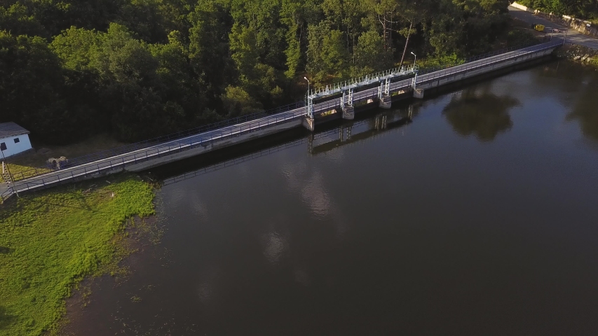 FLYING OVER A DAM SUNNY DAY