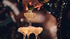happy celebration woman pouring champagne tower at glamorous dance party celebrating with friends enjoying crazy nightlife wearing stylish fashion dancing on rooftop at night 4k footage - Powered by Shutterstock - Get 15% off with code: PIKWIZARD15