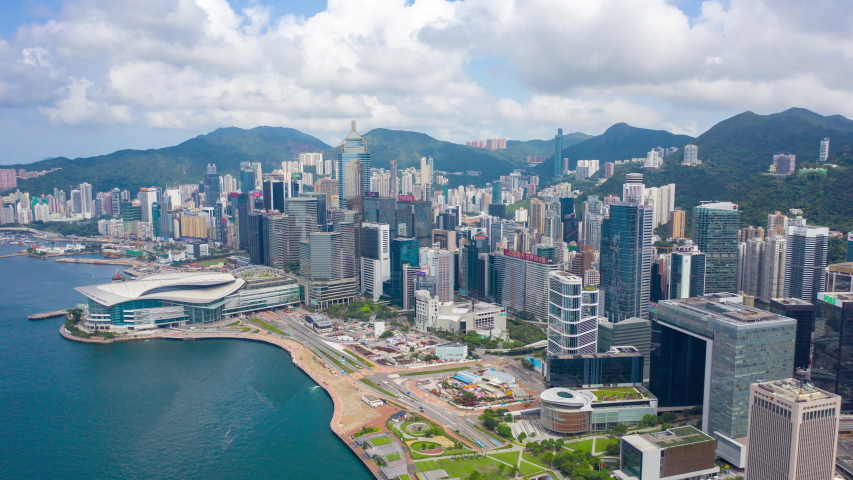 aerial view hyperlapse 4k video of Victoria Harbour in Hong Kong. hyper lapse in hong kong city. Royalty-Free Stock Footage #1034091830