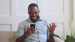 Surprised excited black man winner hold smartphone read good internet news amazed by mobile online bet bid game win, happy african guy look at cell phone screen overjoyed by victory success at home - Powered by Shutterstock - Get 15% off with code: PIKWIZARD15