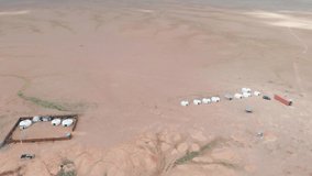 Aerial view of Mongolian Gers on a remote location at the Gobi Desert - Mongolia