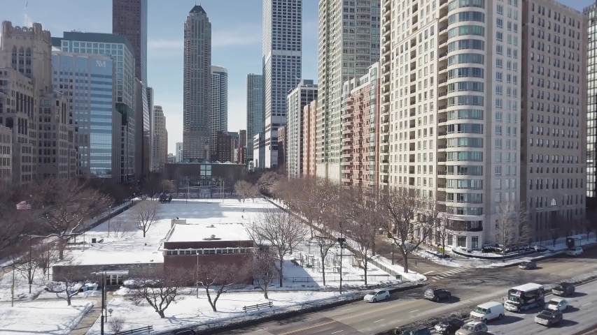 Aerial view of Chicago Downtown In Winter next to frozen lake Michigan
