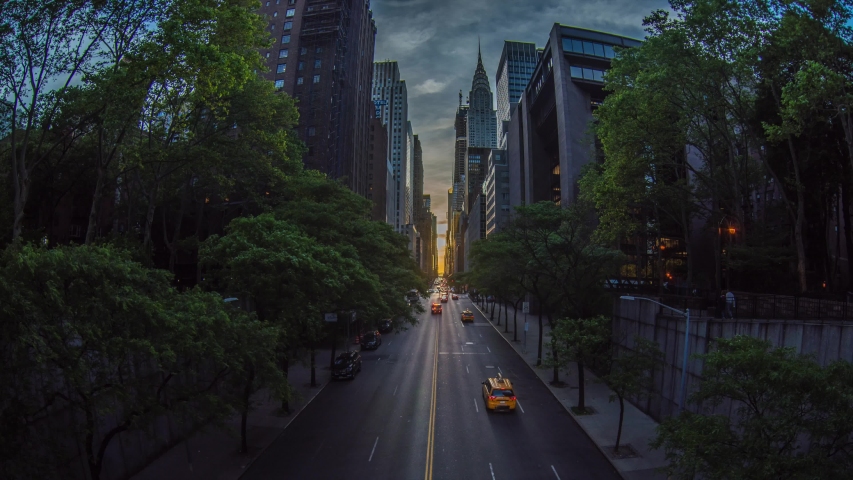 TIMELAPSE: Sunset over 42nd Street with the colorful lights of traffic through Midtown Manhattan, New York City NYC Royalty-Free Stock Footage #1034122832