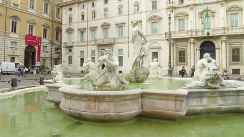 ROME, ITALY - CIRCA 2019: Steadicam shot of classic sculpture, fountain, tourists and architecture in scenic Piazza Navona in Rome, Italy. ProRes file, shot in 4K UHD.