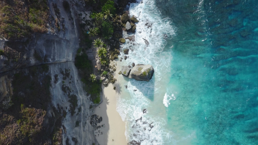 Top Down Aerial Shot Of Diamond Beach Thousand Islands at Nusa Penida, Bali - Indonesia 