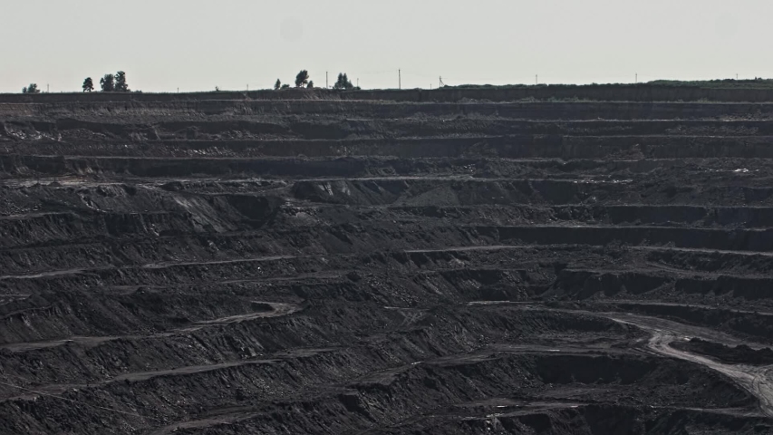 Explosion at open mine. Detonation rocks in quarry Mining. Powerful explosion on open pit mine. View from above on the effects of the explosion. Blast at open quarry