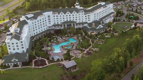 Pigeon Forge, Tennessee / United States -July 16,2019: Dolly Partons Dream More Resort  in the Great Smokey Mountains just before sunset. Families are relaxing, swimming and listening to live music. 