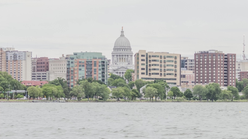 A Telephoto Timelapse Detail Shot of the Wisconsin State Capital Building in Downtown Madison during a Summer Sunset 4K UHD