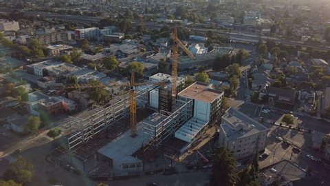 Aerial shot of sustainable building site in modern city, Oakland, California.