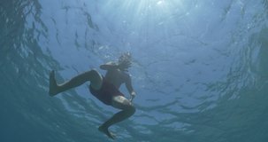 young boy in the sea underwater cine d footage 