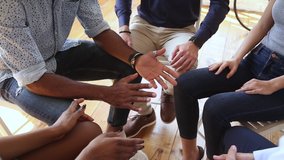 Diverse people talking sit in circle at group counseling therapy session concept, multiracial patients communicating sharing problems get support at rehab addiction treatment meeting, close up view - Powered by Shutterstock - Get 15% off with code: PIKWIZARD15