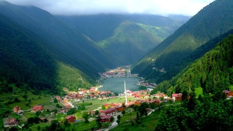 Uzungol (Long Lake) of the most beautiful tourist places in Turkey. The mountain valley with a trout lake and a small village in Trabzon,Turkey. Popular destination for locals and tourists Black sea.