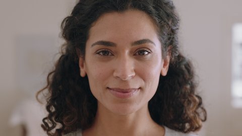 portrait beautiful mixed race woman smiling 30 turns head looking at camera with happy emotion enjoying successful lifestyle