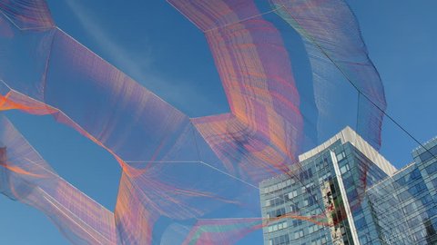 BOSTON - MAY 29: Janet Echelman's "As If It Were Already Here" Aerial Sculpture over the Rose Kennedy Greenway on May 29, 2015 in Boston, Massachusetts.