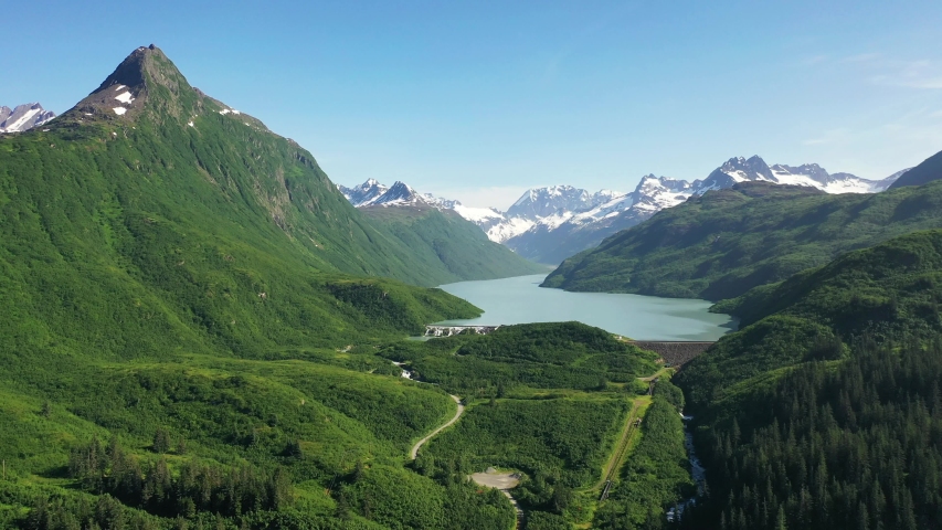 Mesmerizing Chugach Mountains of southern Alaska in the spring season, aerial shot