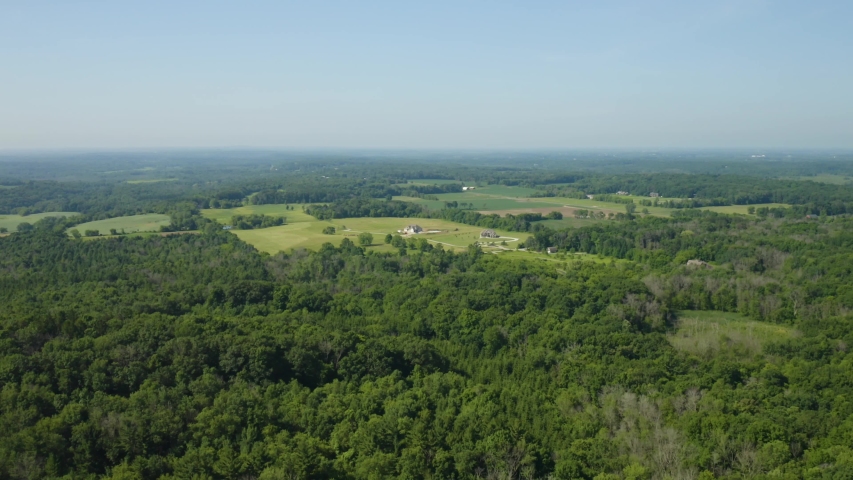Holy Hill National Shrine of Mary, Wisconsin, USA, aerial view with reverse flight through spires to reveal Basilica, drone footage.